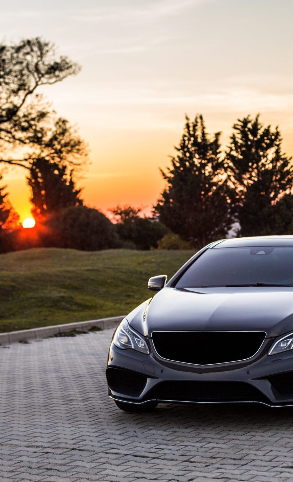 grey-luxury-sedan-car-sunset